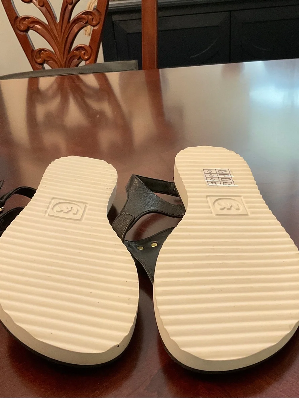 Michael Kors Black Thong Sandals with Gold MK Hardware